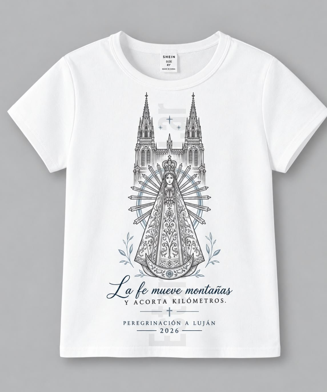 Remera blanca de algodón Virgen de Luján LA FE MUEVE MONTAÑAS